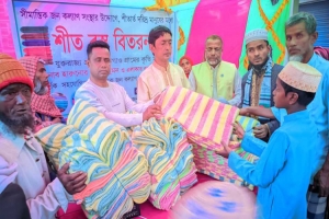 সুনামগঞ্জে দুই শতাধিক নিম্ন আয়ের মানুষের মাঝে শীতবস্ত্র বিতরণ