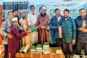 বড়লেখায় ইলিয়াস কাঞ্চনের জন্মদিনে নিসচার কুরআন শরিফ বিতরণ